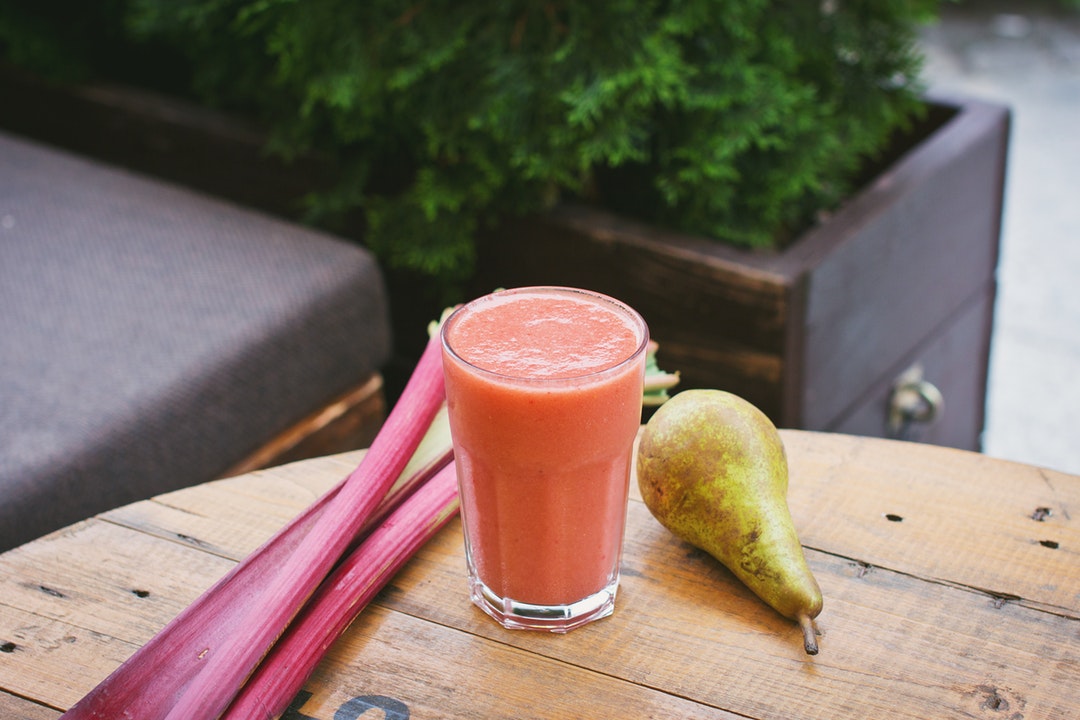 pear and rhubarb with smoothie on table
