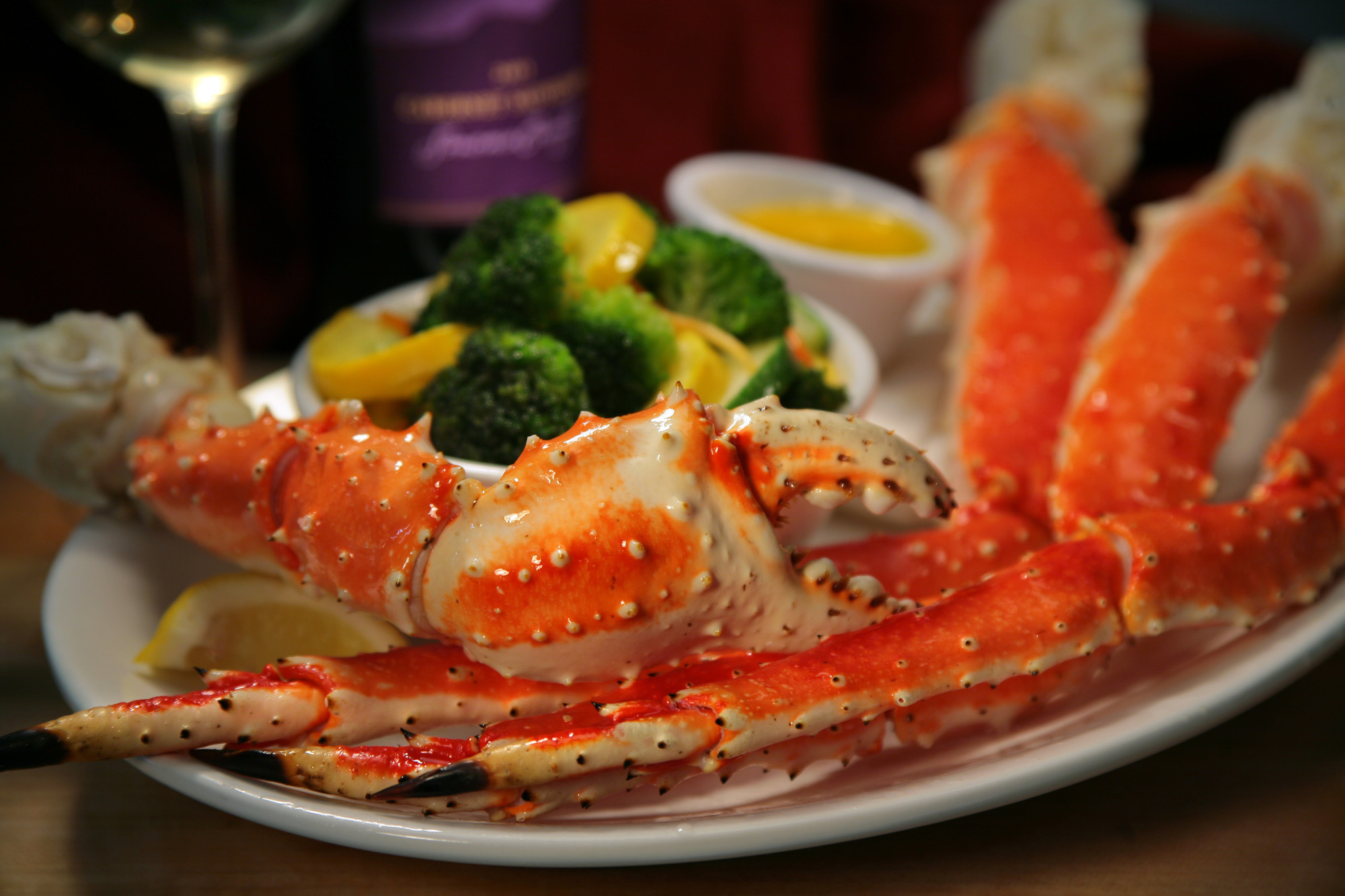 crab on plate with butter and veggies